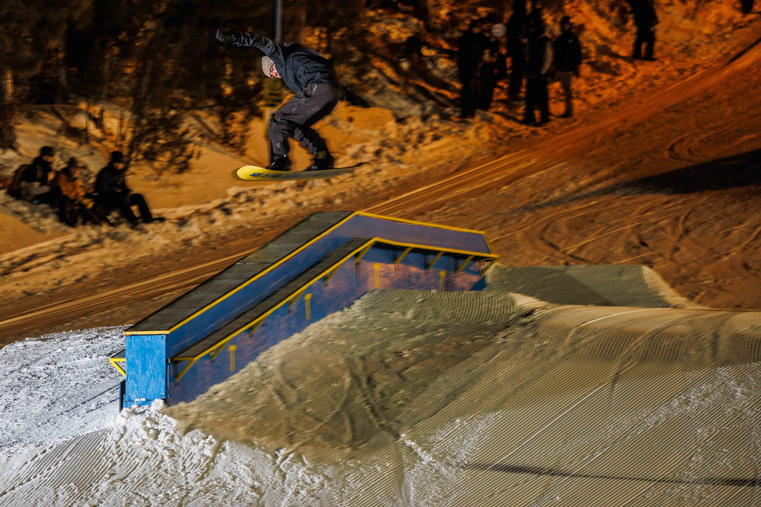 Peter Sutherland snowboards at Trollhaugen